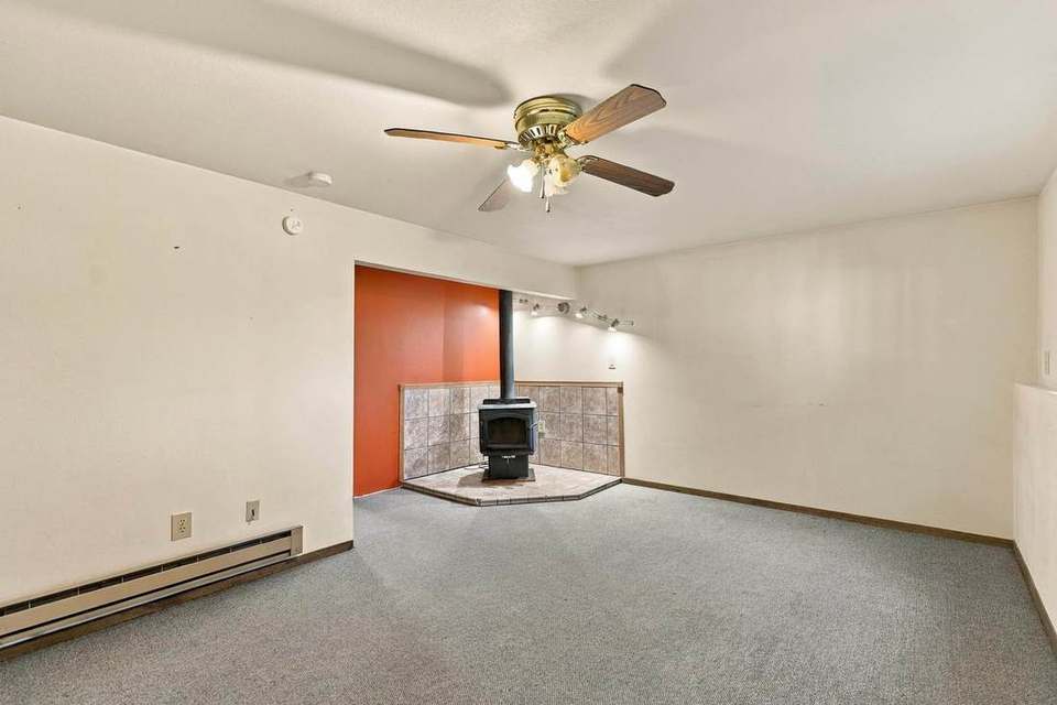 Lower level with cast iron wood stove