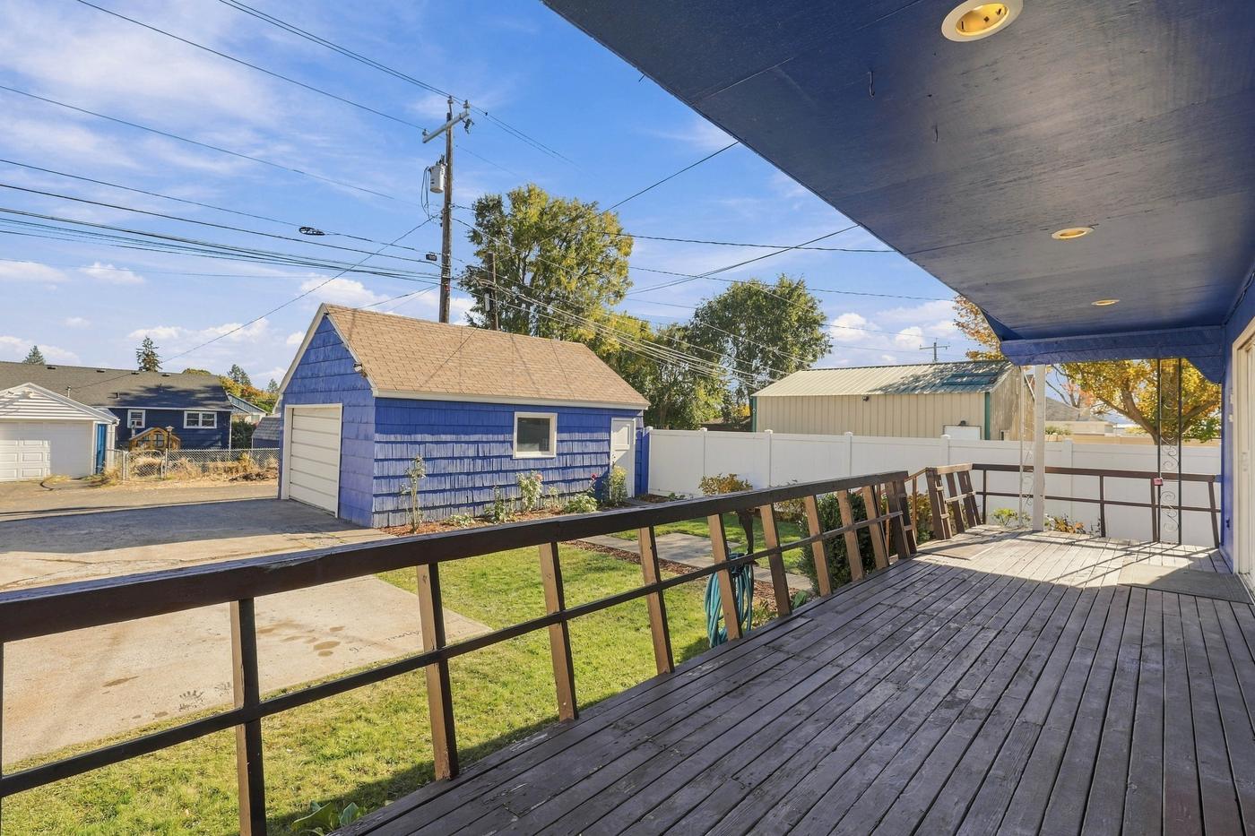Covered porch and open backyard