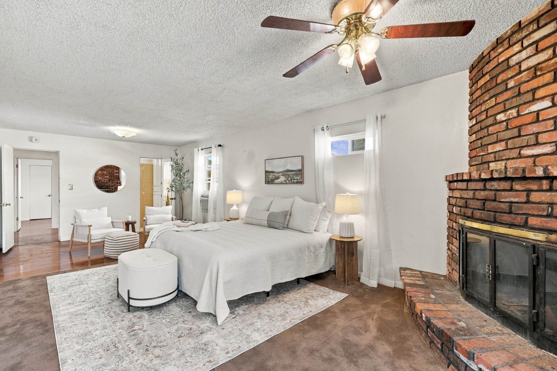 The oversized primary suite with its own fireplace