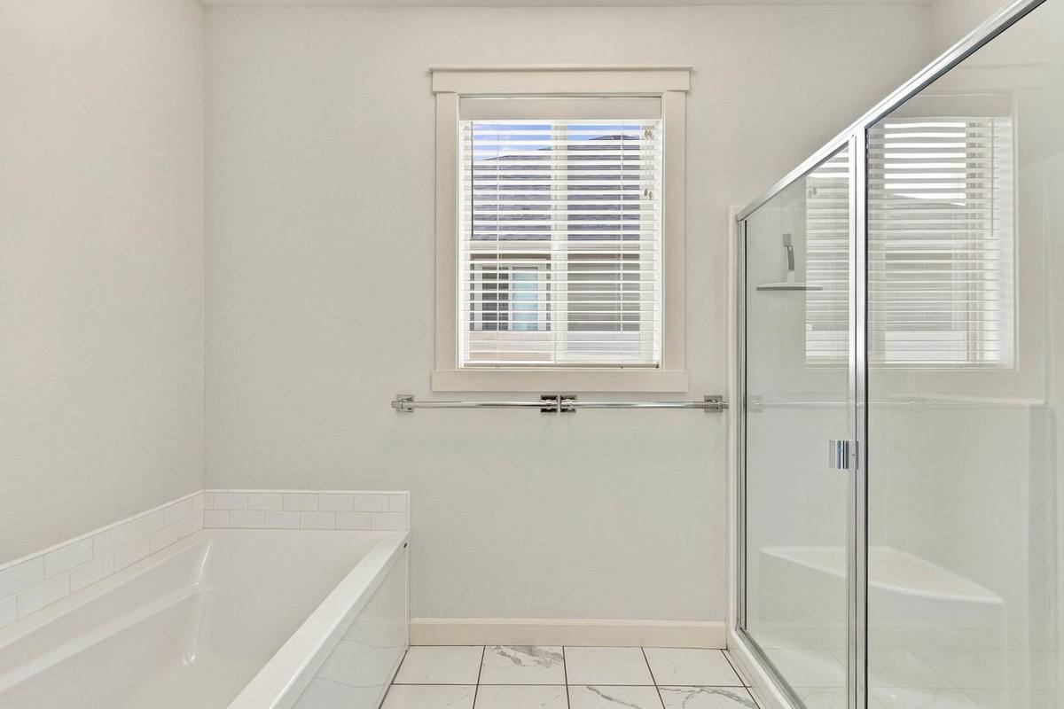 Primary bath with garden tub and separate shower