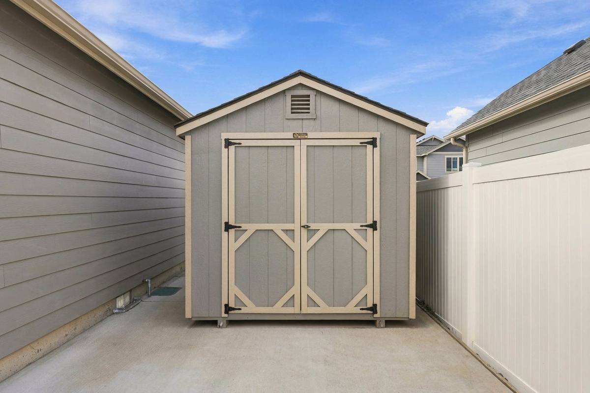 Storage shed in the side yard